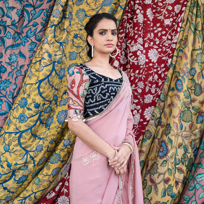 Sandrose-Pink Crape Saree Set With Embroidered Floral Motifs.