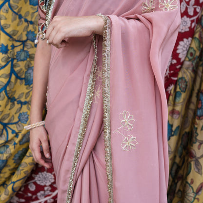 Sandrose-Pink Crape Saree Set With Embroidered Floral Motifs.