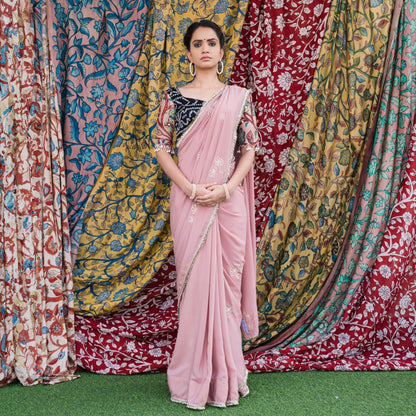 Sandrose-Pink Crape Saree Set With Embroidered Floral Motifs.