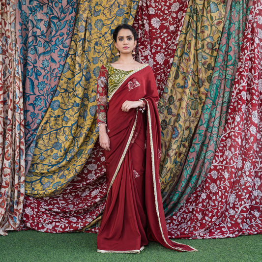 Maroon Crape Saree Set With Embroidered Couple Bird Motifs.