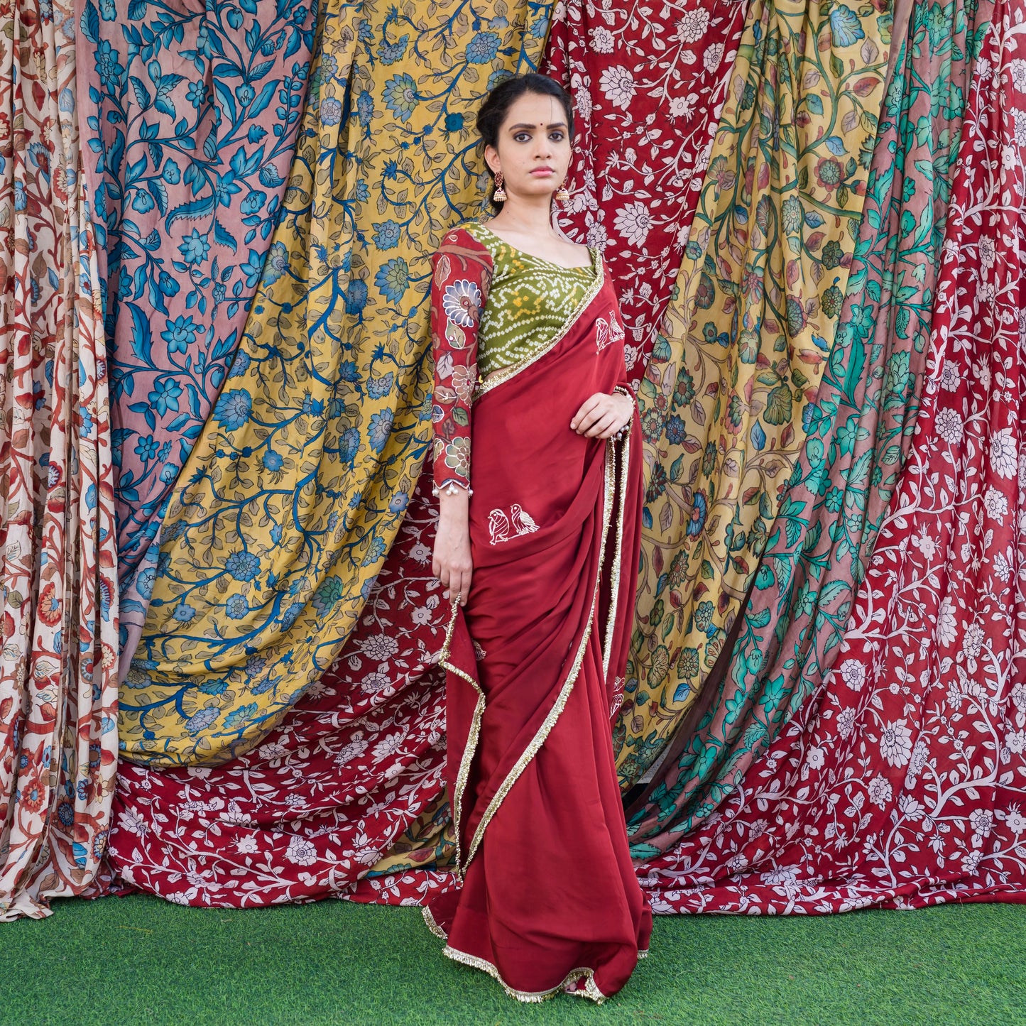 Maroon Crape Saree Set With Embroidered Couple Bird Motifs.