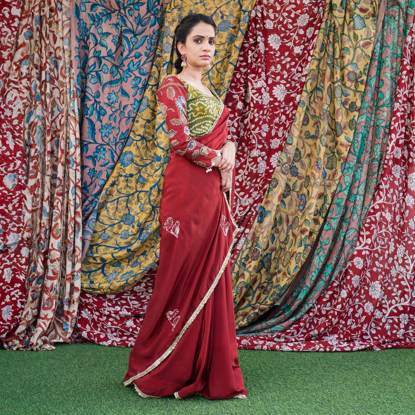 Maroon Crape Saree Set With Embroidered Couple Bird Motifs.