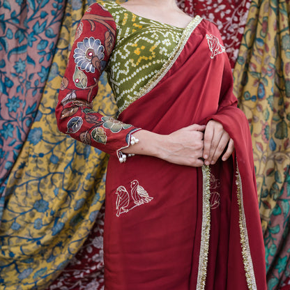 Maroon Crape Saree Set With Embroidered Couple Bird Motifs.