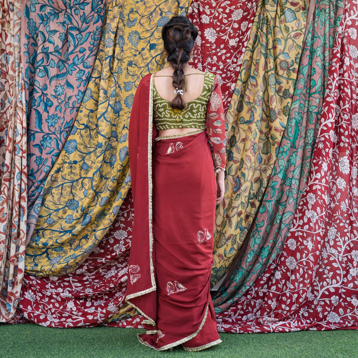 Maroon Crape Saree Set With Embroidered Couple Bird Motifs.