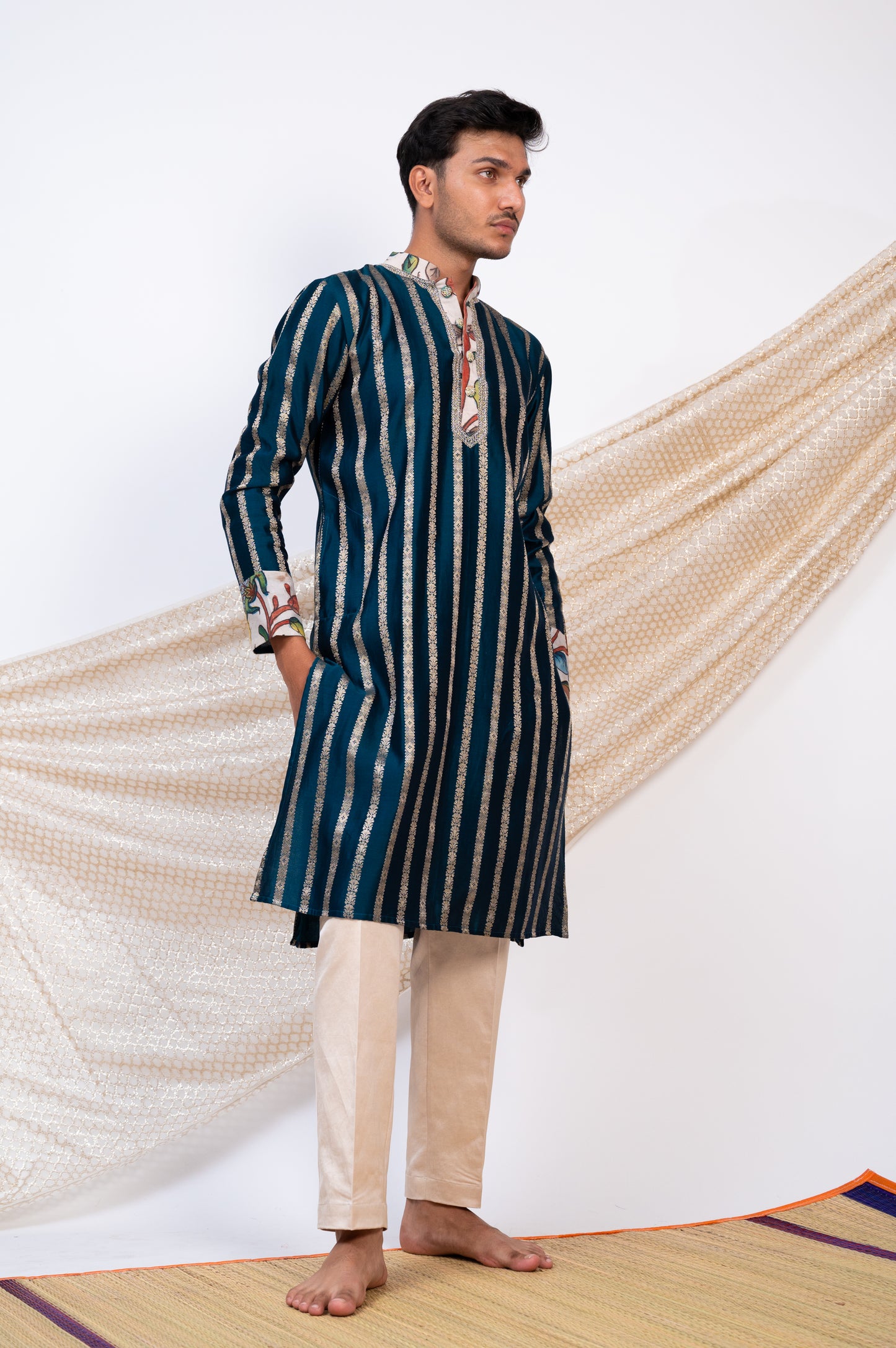 Peacock-Blue Stripes Kurta Set.