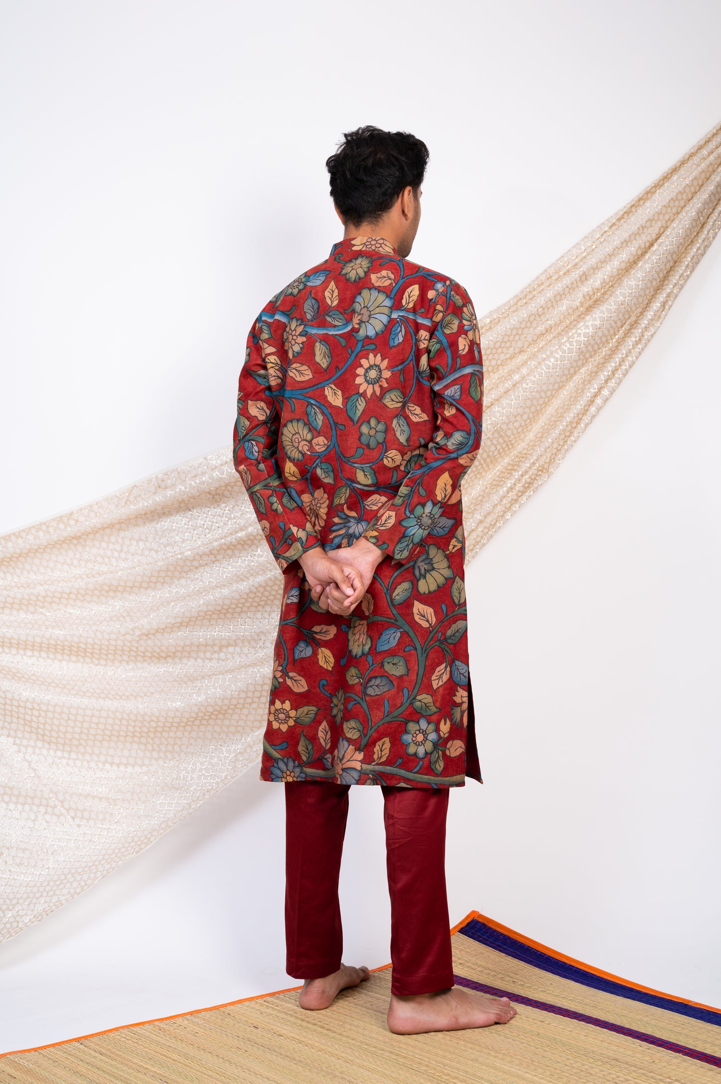 Maroon Hand-Painted Floral Kalamkari Kurta Set.