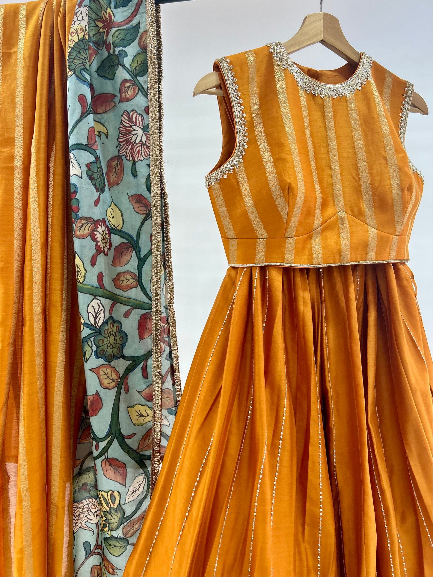 Mustard Yellow Lehenga Set With Kalamkari Detailing.