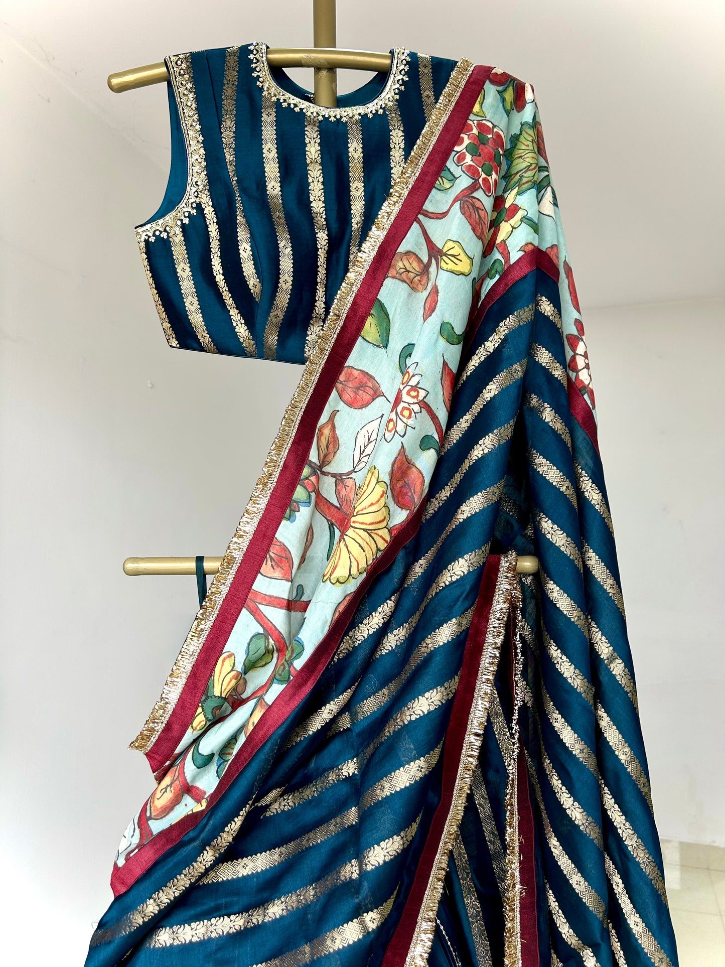 Peacock-Blue Lehenga Set With Kalamkari Detailing.