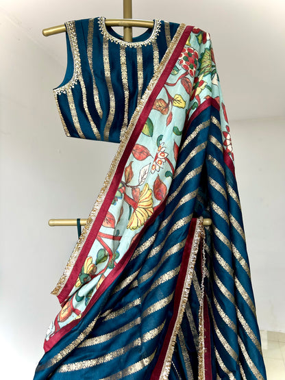 Peacock-Blue Lehenga Set With Kalamkari Detailing.
