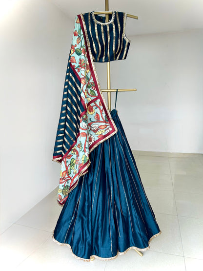 Peacock-Blue Lehenga Set With Kalamkari Detailing.