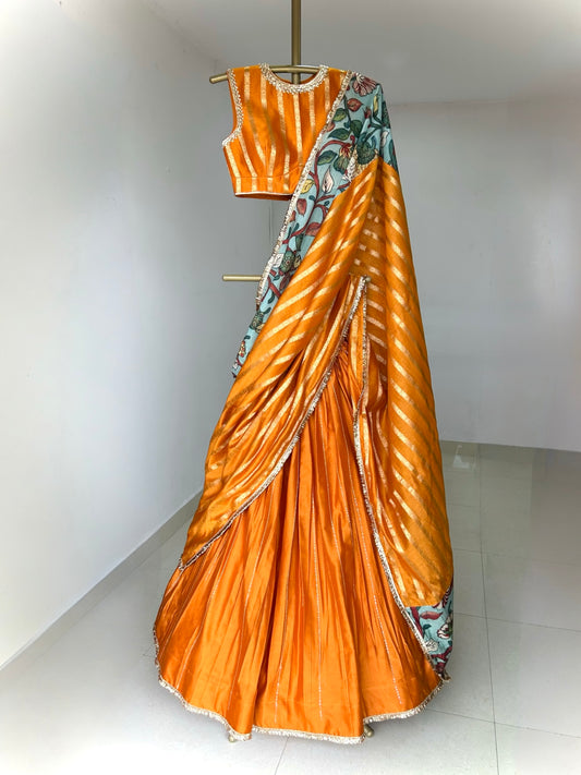Mustard Yellow Lehenga Set With Kalamkari Detailing.