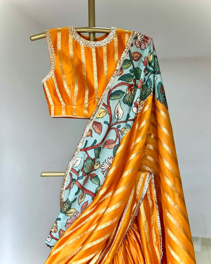 Mustard Yellow Lehenga Set With Kalamkari Detailing.
